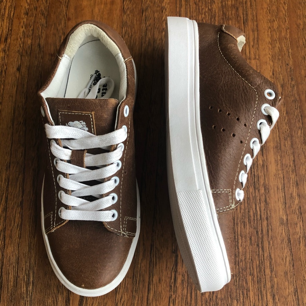 Roots Shoes   100% leather .